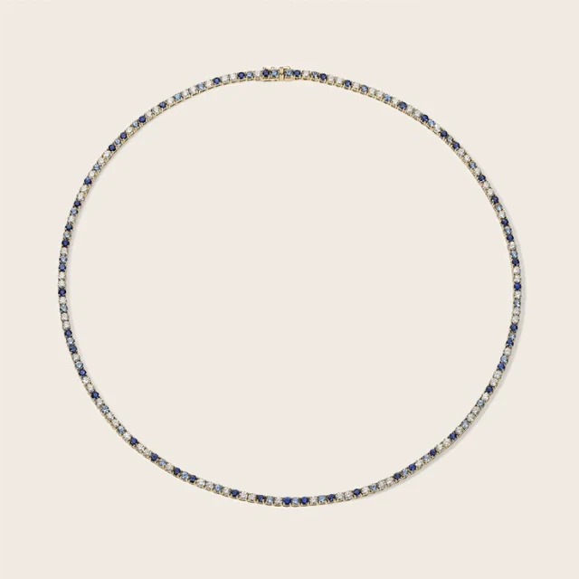 The sapphire line necklace in yellow gold photographed flat
